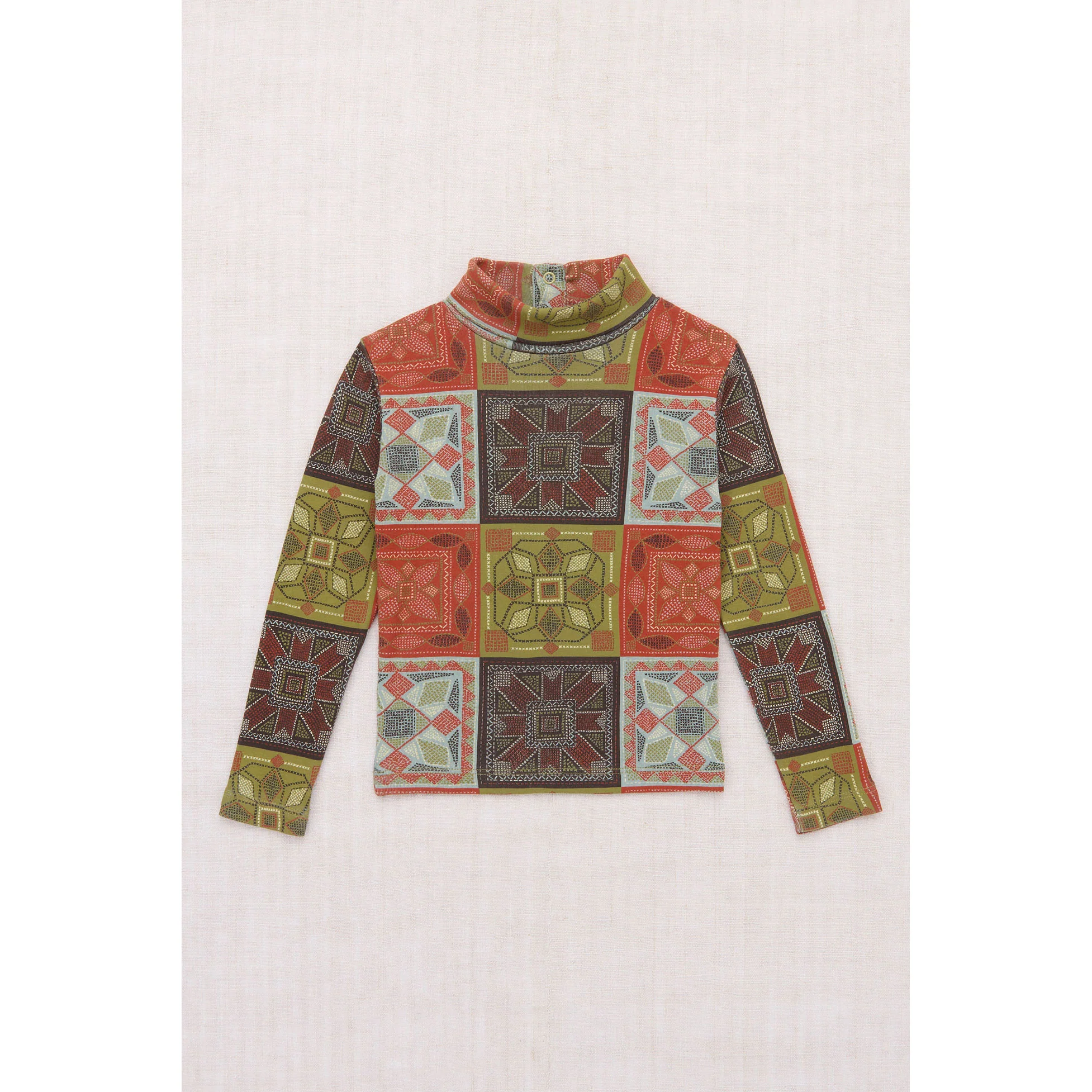 Misha and Puff Chili Spice Cross Stitch Turtleneck