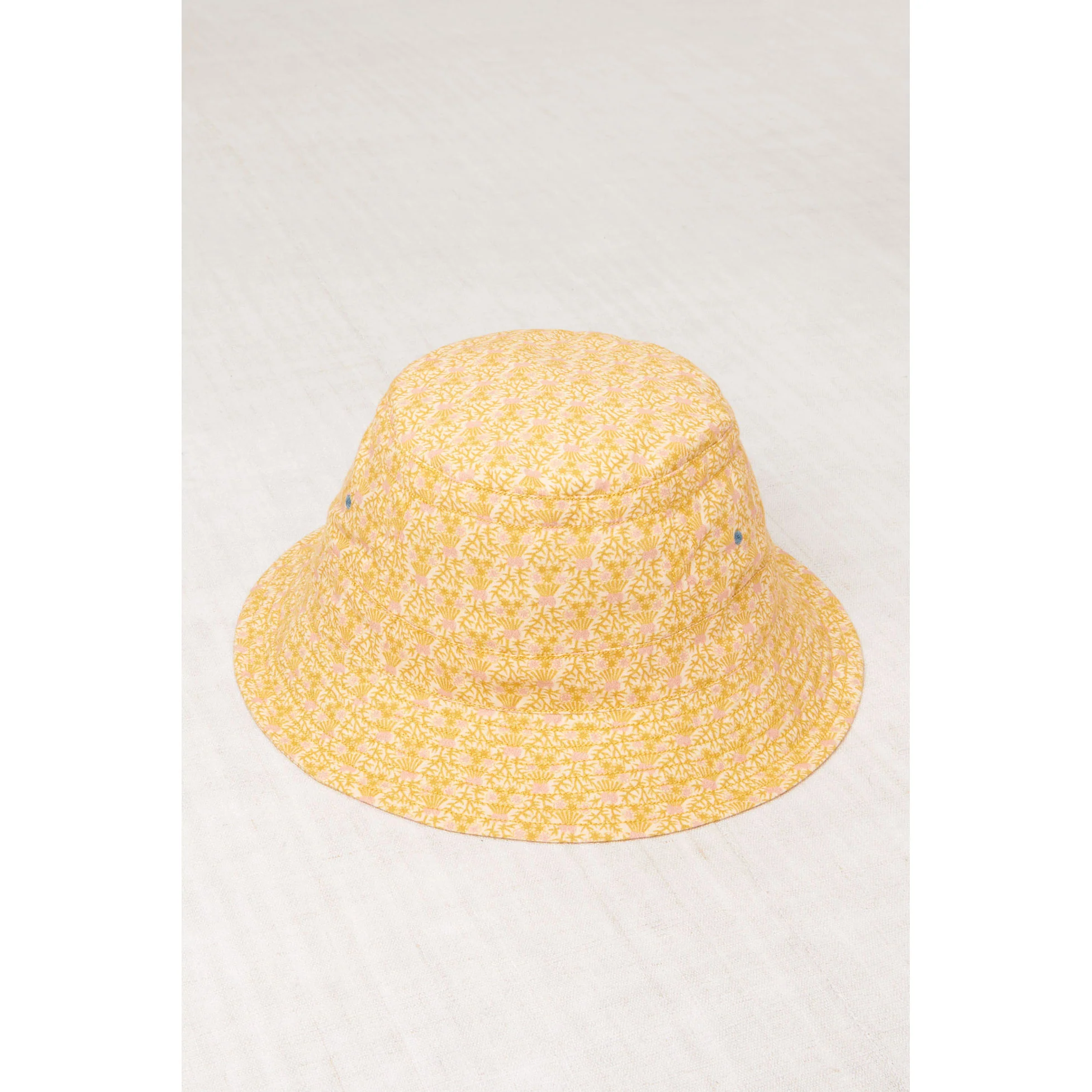 Misha and Puff Golden Orche Radish Root Bucket Hat