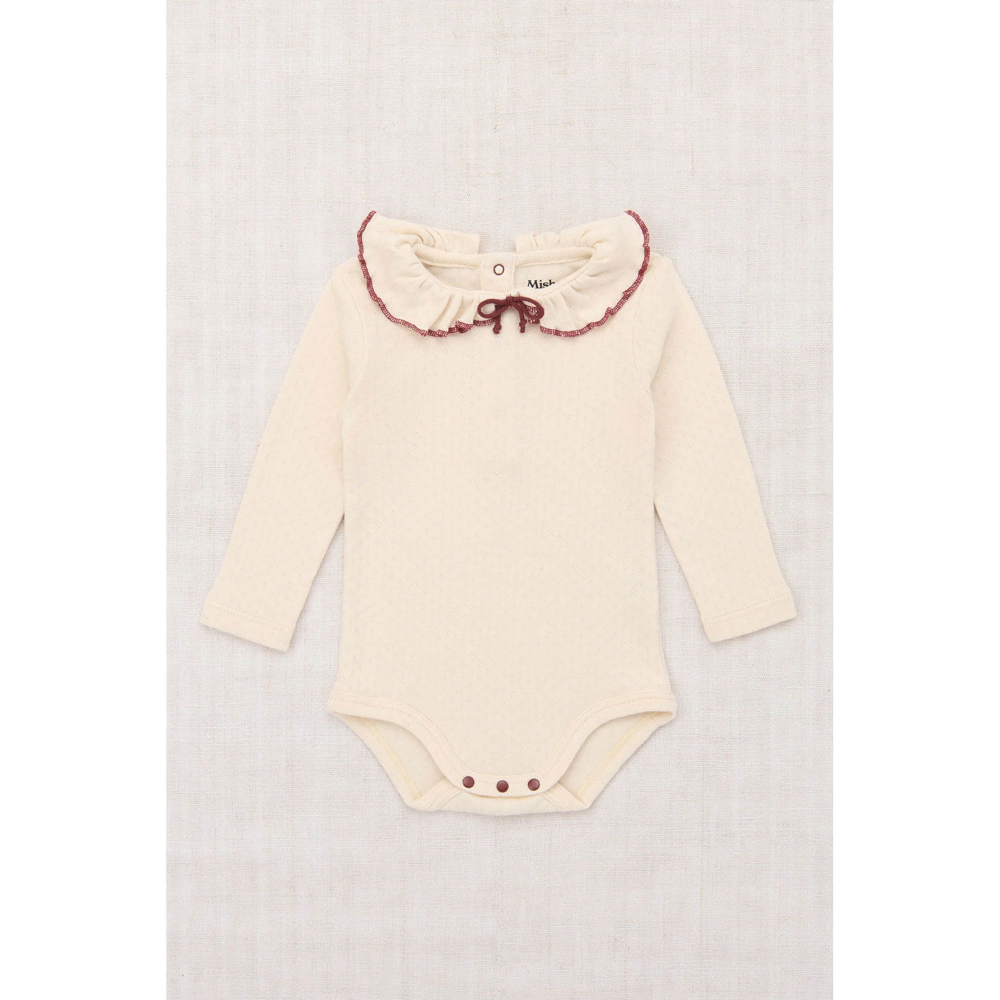 Misha and Puff  String Pattie Onesie