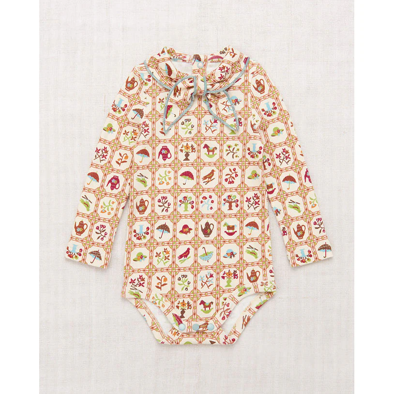 Misha and Puff  String Trellis Scout Onesie